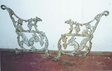 damaged cast iron bench ends